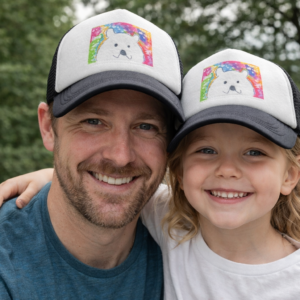 Father and daughter with matching trucker hats