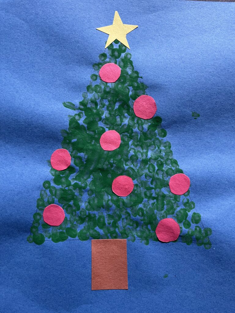 Christmas tree made with construction paper and dots painted with q-tips