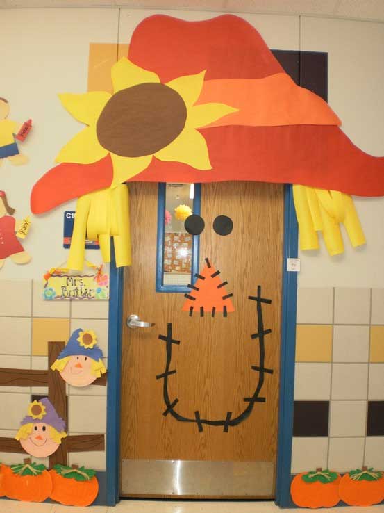 Classroom door decorated as scarecrow