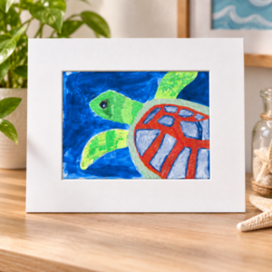 White matted print with turtle artwork