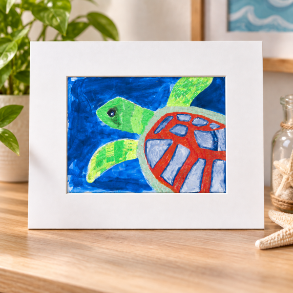 White matted print with turtle artwork