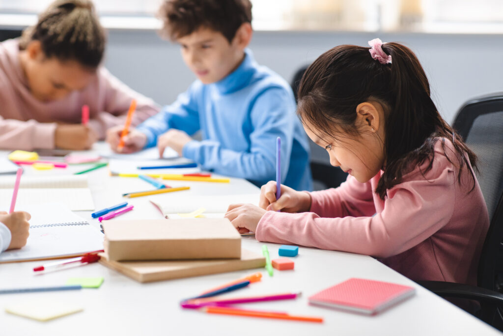 school children coloring